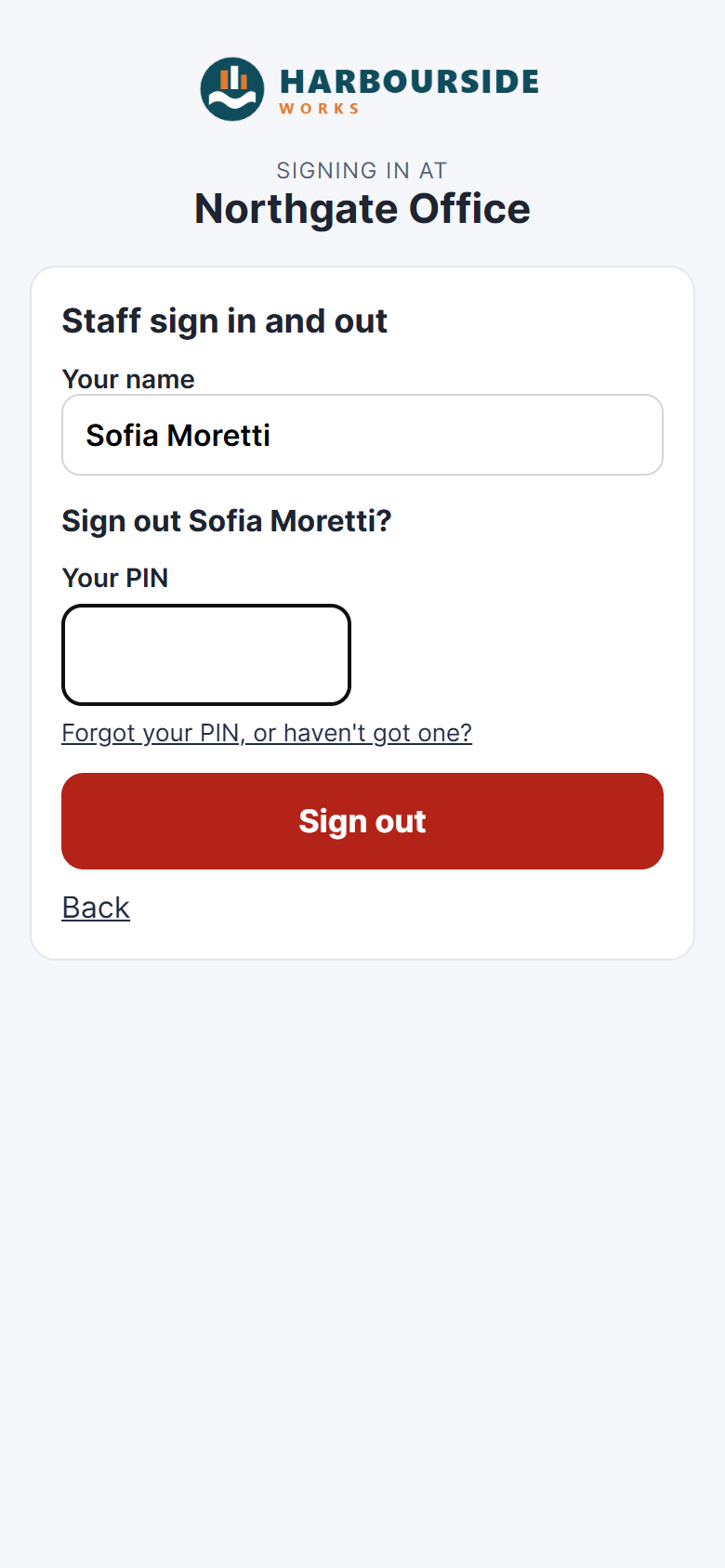 A member of staff signing out on their phone